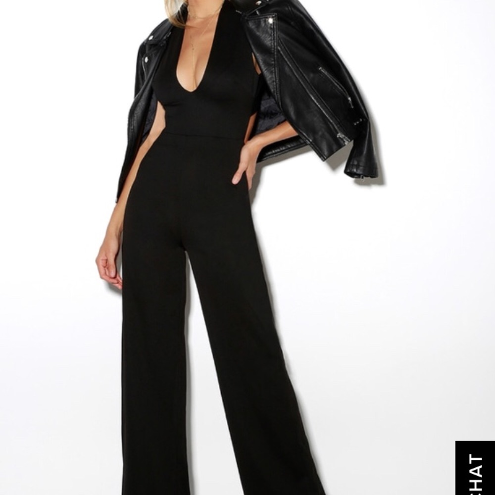 Lulus black jumpsuit size S. New with tags.